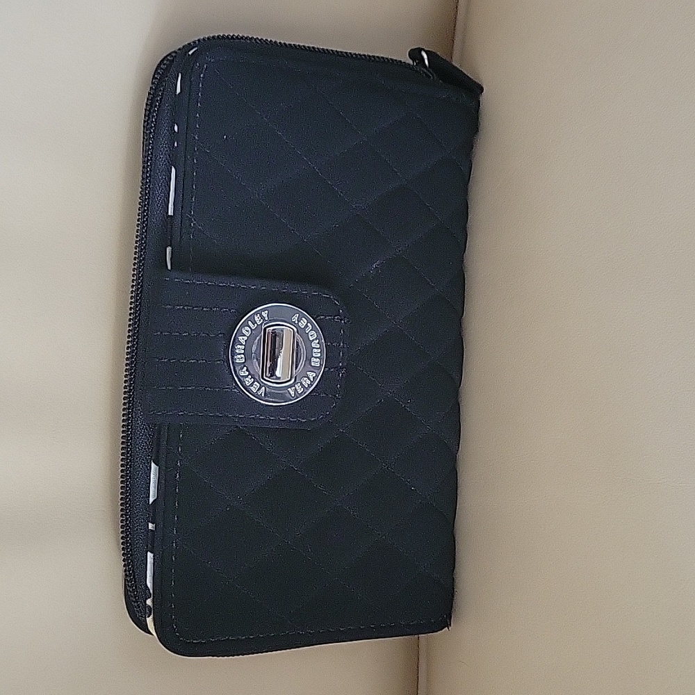 Vera bradley kiss lock wallet. Excellent condition. Hardly worn.